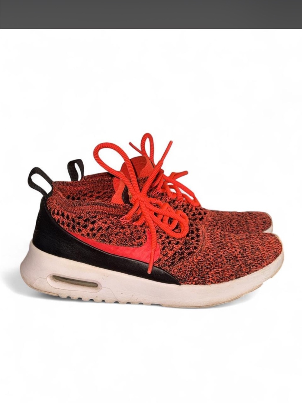 Nike Neon Orange and Black Flyknit Casual Sneakers